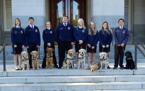 Members of the Lemoore High School FFA Guide Dog Puppy Raising Project, this year's recipient of the Chamber's Organization of the Year.